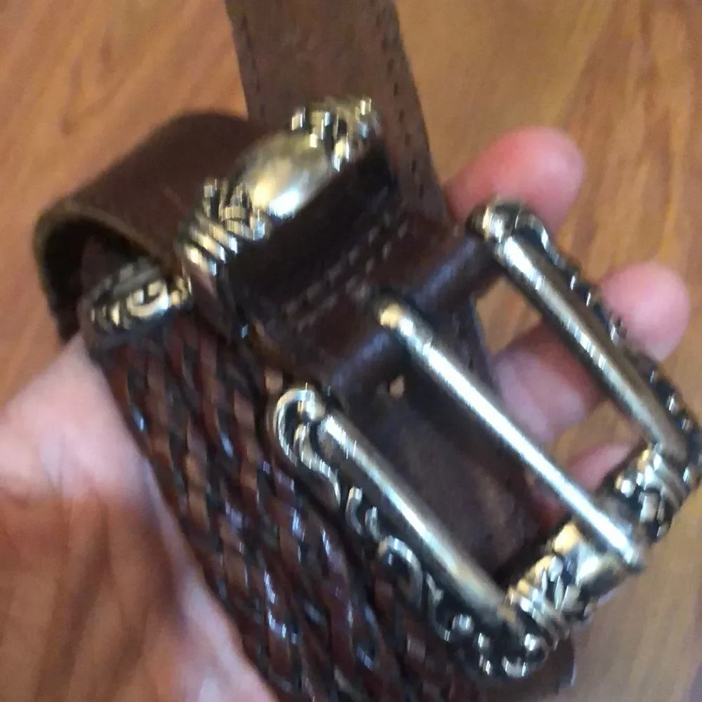 Brighton style genuine leather brown belt with silver detail.